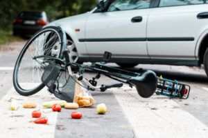 A cyclist hit by a car