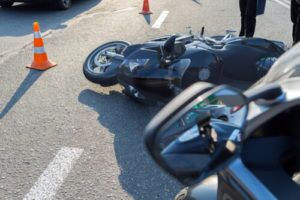 Motorcycle lying on the road after a crash