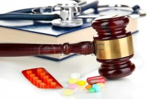 Drugs with gravel representing prescription drug lawsuit