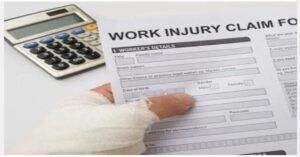 Injured worker holding a work injury claim form