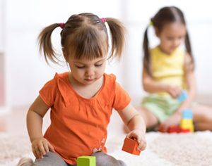 child playing with toys