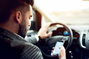 Driver using mobile phone while driving